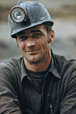 Worker with headlamp